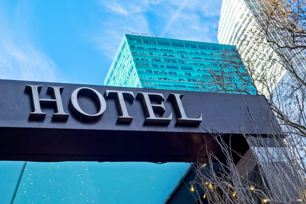 Hotel building energy management for charging infrastructure